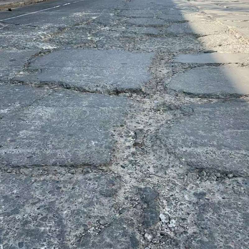 绿园路面起砂露石子修补料